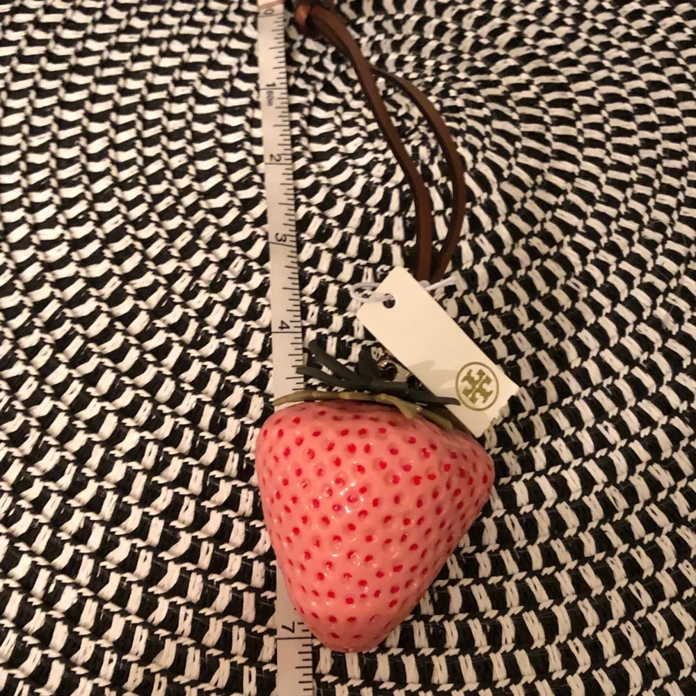 Authentic New with tag. Tory Burch Pink Strawberry bag charm.